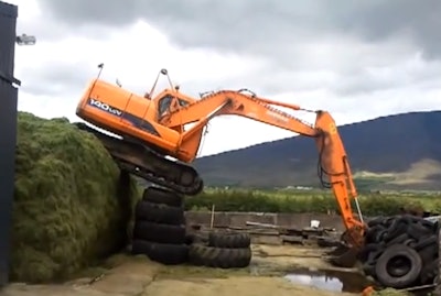 Excavator silage pile