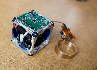 A prototype of the self-assembling cubes. Credit: M. Scott Brauer/MIT News