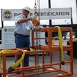 Thomas De Soo, director I&I Sling/Slingmax Rigging Solutions, demonstrates a typical test situation used in qualifying and certifying rigging personnel.