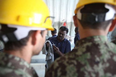 Afghan National Army soldiers from the 215th Corps’ Engineer Kandak and all four brigades learn engine components of a 7-ton vehicle at the engineer lot on Camp Shorabak, Helmand Province, Afghanistan on Nov. 2. Credit: Sgt. Bryan Peterson