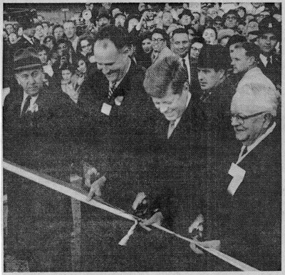 A newspaper clipping from 1963 shows President John. F. Kennedy, Delaware Governor Elbert Carvel and Maryland Governor J. Millard Tawes cutting the ribbon at the Delaware Turnpike’s opening ceremony. (Photo via Delaware Public Archives)