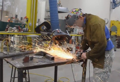 A welder working inside the Macy’s Thanksgiving Day Parade studio. Credit: Bill Delano/USA Today