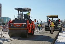 A parking lot demonstration of RCC went on for four afternoons and and included test strip placement, curing, saw cutting and testing at World of Concrete 2013.