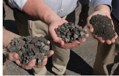 Raw reclaimed asphalt pavement (RAP) awaits fractionation to clean, screened sizes