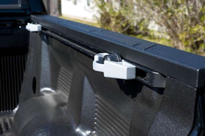 Bed tie-downs are standard. Drop-in bed liner is a $365 option.