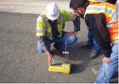 Detail of New Braunfels roller-compacted concrete pavement was grooved to provide a smooth riding surface.