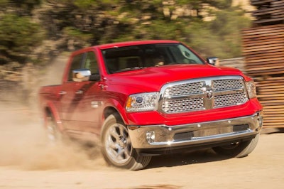 2014-Ram-1500-Ecodiesel-front-three-quarters-view-in-motion