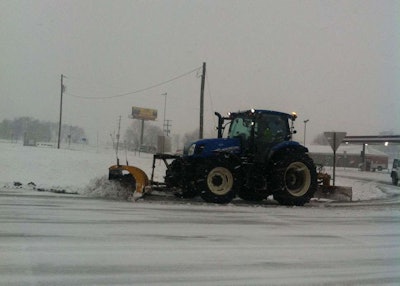A tractor clears the ramp on Exit 125 on northbound Interstate 55 in Perry County, Missouri, on January 5, 2014, during the Midwest storms that brought temperatures down to well below zero. (Photo: MoDOT)