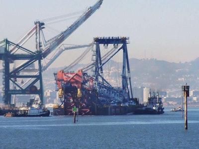 The Left Coast Lifter leaves the Port of Oakland. Credit: @NewNYBridge Twitter account.