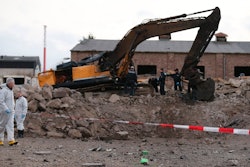 Police examine a construction disposal site where a World War II bomb exploded in Euskirchen, Germany. Credit: Frank Augstein/AP