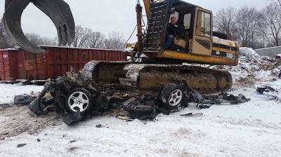 Excavator destroys Dodge Viper