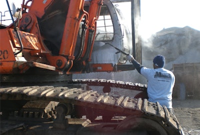 construction-equipment-cleaning-cab-before