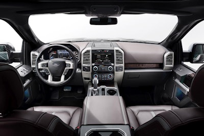 The interior is wider, the center console deeper, and storage under rear seat all add to the new mobil office. (Click to view larger.)
