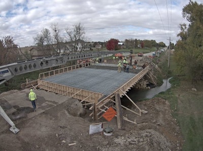As a part of his work with eSPAN140 and the Bridge Technology Center, Dr. Karl Barth, West Virginia University, set in place measurement tools just before the deck pour on Oct. 24. The purpose is to monitor major axis bending and lateral flange bending during the placement of the concrete deck.