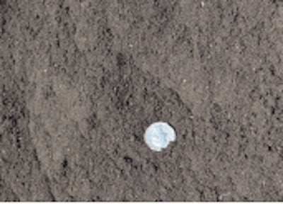 The recycled asphalt shingles on the left are ground to 3/8-inch minus, and the RAS on the right are ground to 1/10-inch minus.