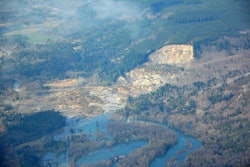 A landslide occurred near Oso, Washington on Saturday, covering a portion of State Route 530. (Photo Credit: @WSDOT / Twitter)