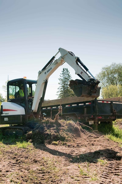 The new Tier 4-compliant E32i (pictured) and E35i feature have about 8 percent more fuel efficiency and a new forward-mount instrumentation system.