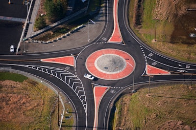 In North America, non-orthagonal roundabouts are becoming a more common site.