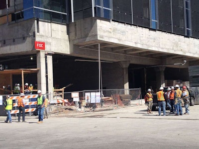 The scene of the Colorado Tower construction site after a worker was pinned by an elevator. Credit: Natalie Hee/KXAN