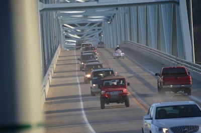 The first vehicles traveled across the new Milton-Madison Bridge on Thursday shortly after the span opened at 7:20 p.m. (Photo credit: Milton-Madison Bridge Project)