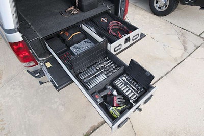 Bed slide-out storage systems like this A.R.E. Pickup Vault help keep tools organized and secure.