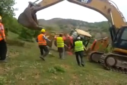 Backhoe down hill
