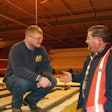 Jobsite chaplain Dan Schallmo, of Marketplace Chaplains, speaks with a construction worker.