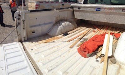 The aluminum bed of an F-150 prototype Ford embedded at a gold mine. Lots of abuse. No rust.