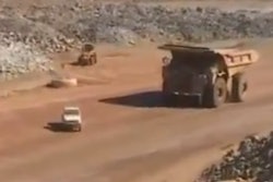 Cat 797B flatten Land Cruiser