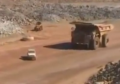 Cat 797B flatten Land Cruiser