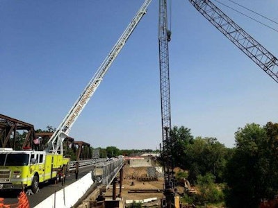 The crane from which two construction workers fell is seen at a jobsite in Burlingame, California. Credit: Melody Gutierrez/San Francisco Chronicle