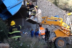 backhoe rescue of truck driver over tunnel Israel