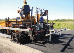 Northeast Asphalt, in Appleton, Wisconsin, uses a temperature bar to assist with paving a roadway in Wisconsin.