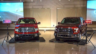 The aluminum-bodied 2015 F-150 (right) weighs in at a full 732 pounds lighter than the 2014 model.