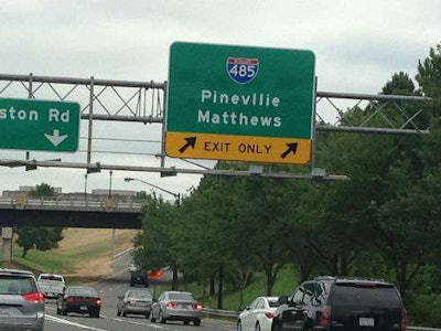 The original sign with Pineville misspelled. (Christine Nelson/WBTV)