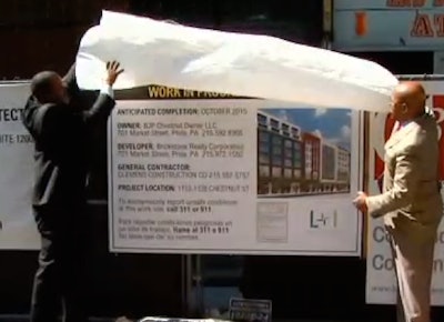 Philadelphia city officials unveil the new required signage for construction and demolition projects. Credit: CBS Philadelphia