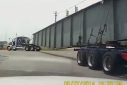 truck hauling steel beam