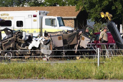 The aftermath of a truck accident that resulted in four fatalities. — Alex Garcia, Chicago Tribune.