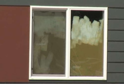 This painted-over window is just one example of damage done by an 11-year-old boy at a jobsite in South Dakota. Credit: Brandon Van Western/Keloland TV