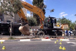 The crime scene in the aftermath of a terrorist attack in Jerusalem carried out with an excavator. Credit: Micky Rosenfeld/Twitter @MickyRosenfeld