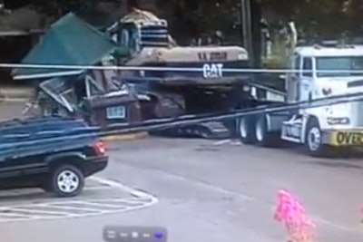 Excavator destroys guardhouse