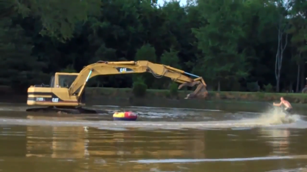 Excavator water skiing