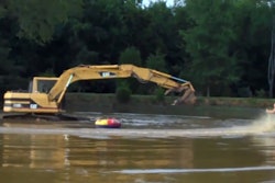 Excavator water skiing