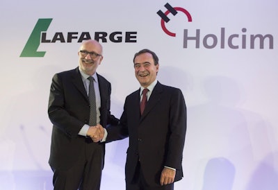 Holcim President Rolf Soiron, left, and Lafarge CEO Bruno Lafont, right, announce their planned merger on April 7, 2014.