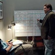 Brad Pitt, as A’s general manager Billy Beane, and Jonah Hill as assistant GM Peter Brand, discuss expected wins and losses based on rosters in the 2011 film “Moneyball.”