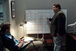 Brad Pitt, as A’s general manager Billy Beane, and Jonah Hill as assistant GM Peter Brand, discuss expected wins and losses based on rosters in the 2011 film “Moneyball.”
