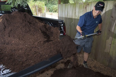 Senior Editor Bruce Smith hard at work during Ram 1500 road test. (Photo By Larry Walton/Editorial Services West.)