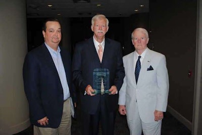 MDOT Chief Engineer Mark McConnell, left, and Transportation Commissioners Tom King and Dick Hall accept the America’s Transportation Award.