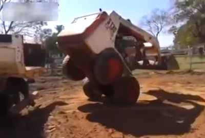 Bobcat wheelie into truck