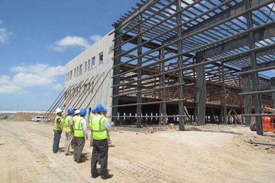 Corpus Christi International Airport officials get a look at construction progress on a new U.S. Coast Guard facility being built next to the airport.